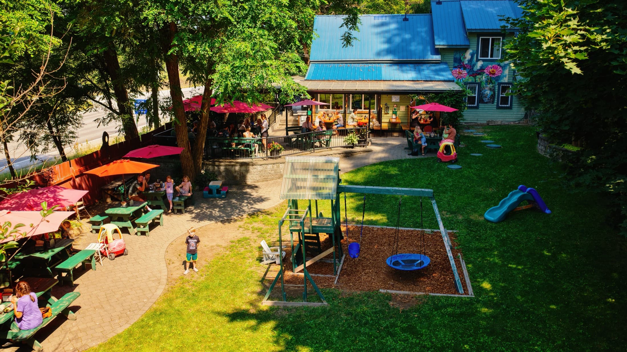 Aerial view of the Frog Peak patio, playground and backyard